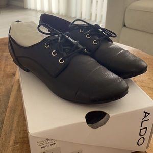 Black loafers with shoes laces